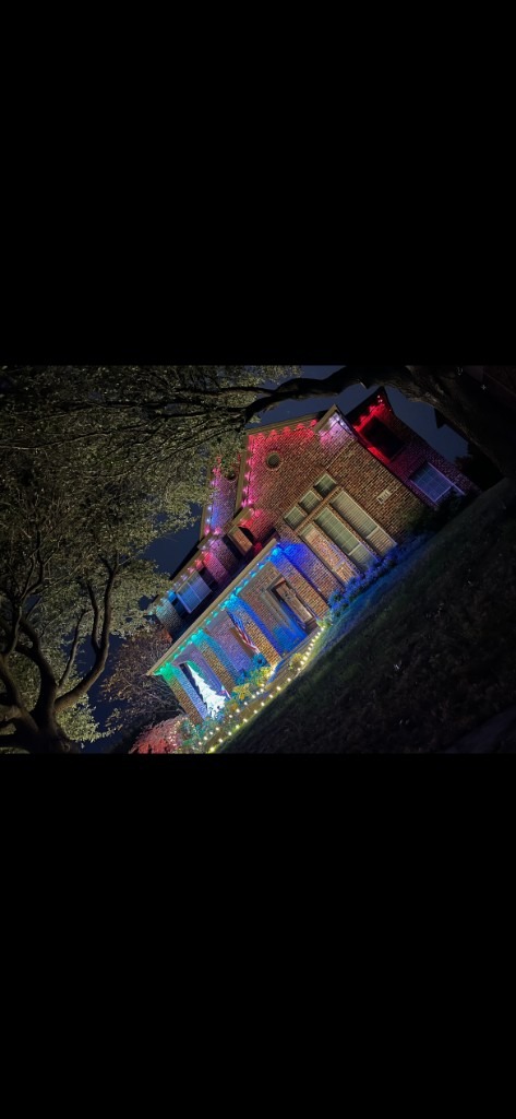 Colorful house lighting with walkway lights