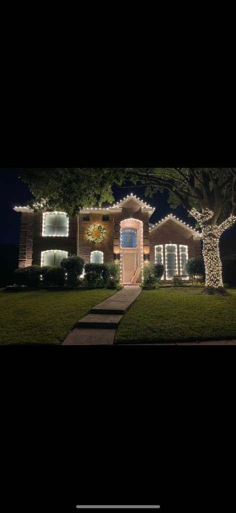 Purple peak and garage lighting at night